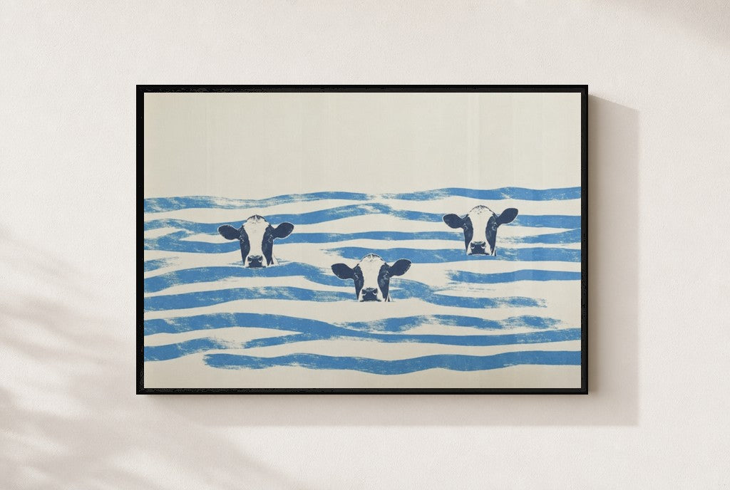 Three in the Waves print, mounted in a black wood frame on a cream wall.