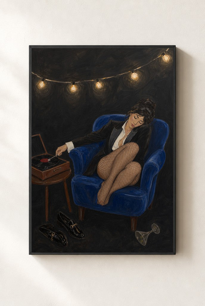 Tux, Vinyl, Cobalt print, mounted in a black wood frame on a cream wall.