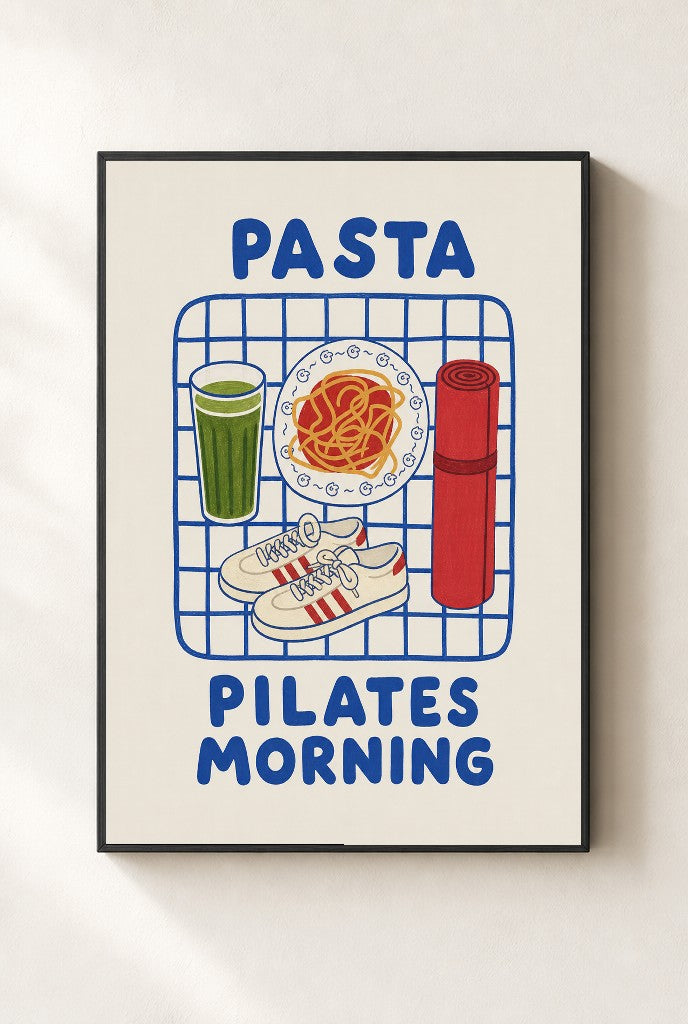 Pasta Pilates Morning print, mounted in a black wood frame on a cream wall.