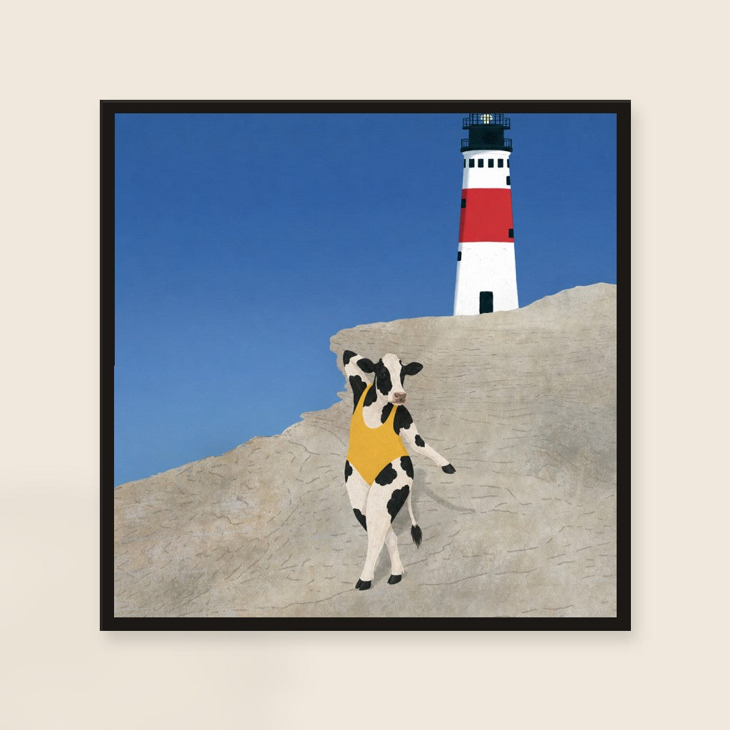 Yellow at the Lighthouse print, mounted in a black wood frame on a cream wall.