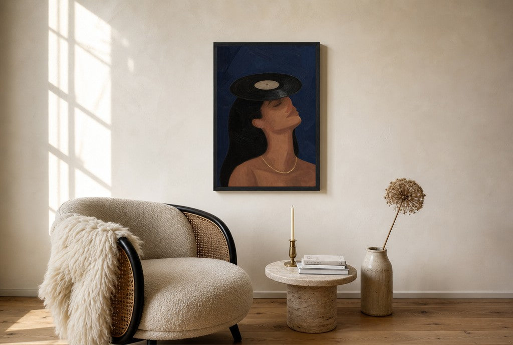 Oversized Vinyl on Her Head leaning at the baseboard of a sunlit living room.