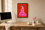 Framed Polka in Motion hung above a mid-century walnut console with ceramics.