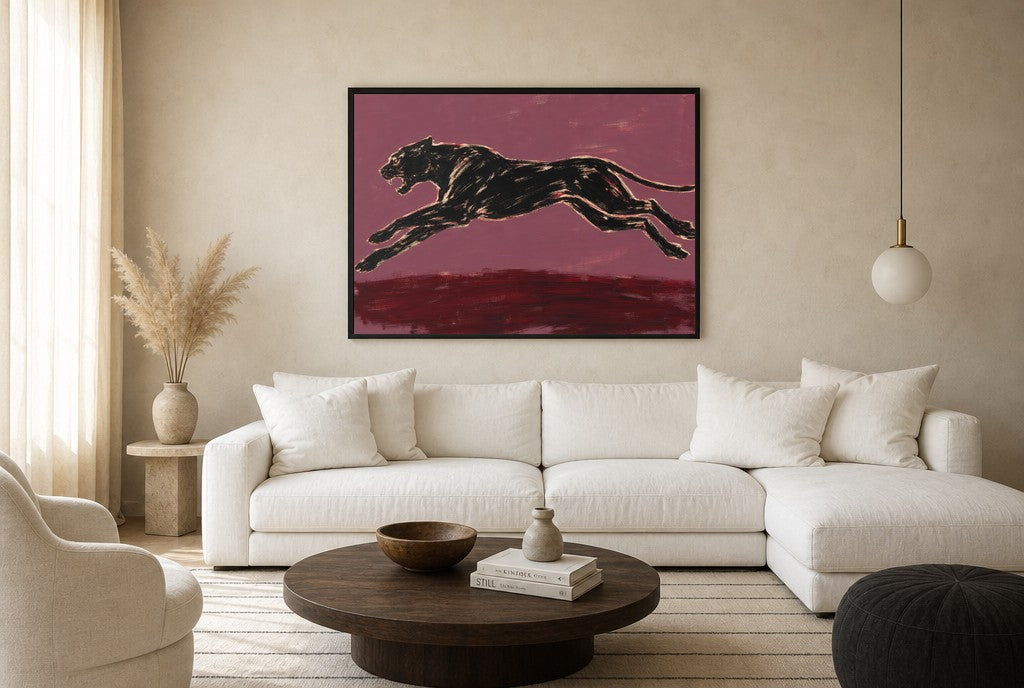 Oversized Black Panther, Plum leaning at the baseboard of a sunlit living room.