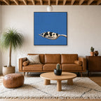 Framed House Special hung above a mid-century walnut console with ceramics.