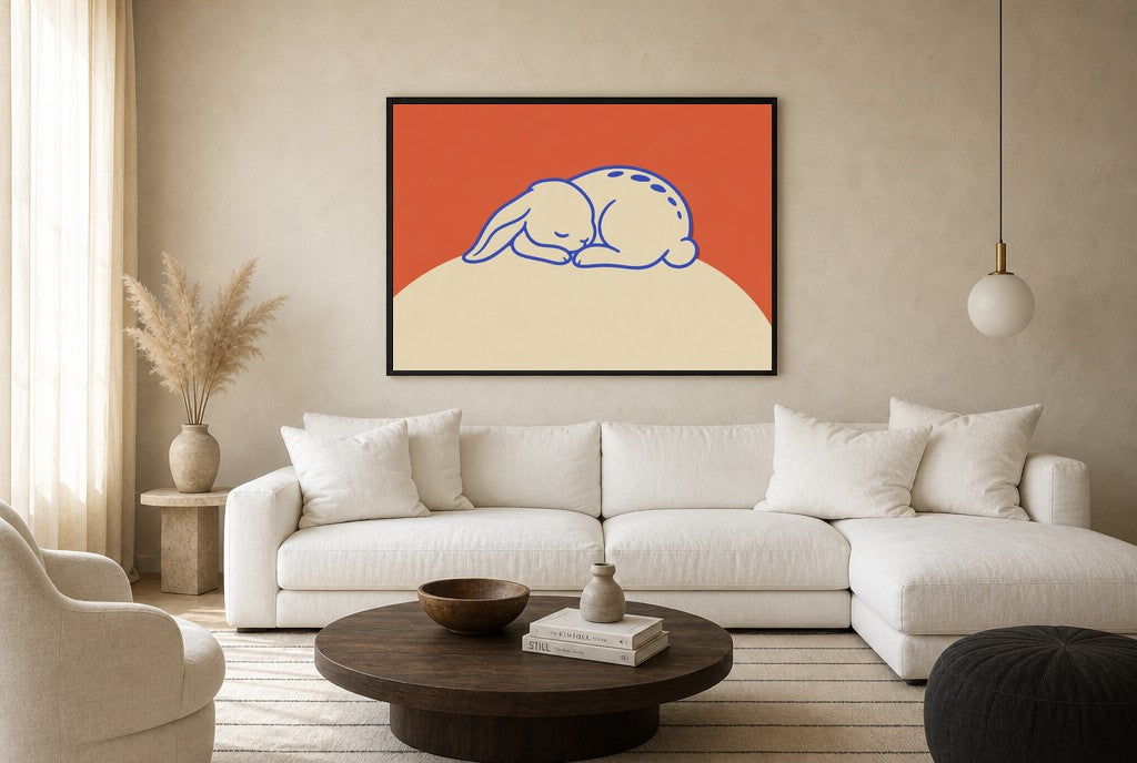 Oversized Sleeping Bunny leaning at the baseboard of a sunlit living room.