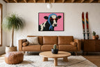 Framed Gingham and Cat-Eyes hung above a mid-century walnut console with ceramics.