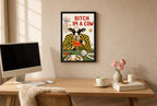 Framed Bitch I'm a Cow hung above a mid-century walnut console with ceramics.