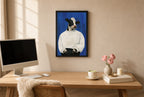 Framed Calm in a White Sweater hung above a mid-century walnut console with ceramics.