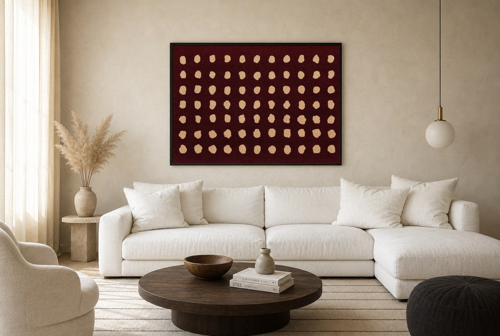 Oversized Cream Dots, Oxblood leaning at the baseboard of a sunlit living room.