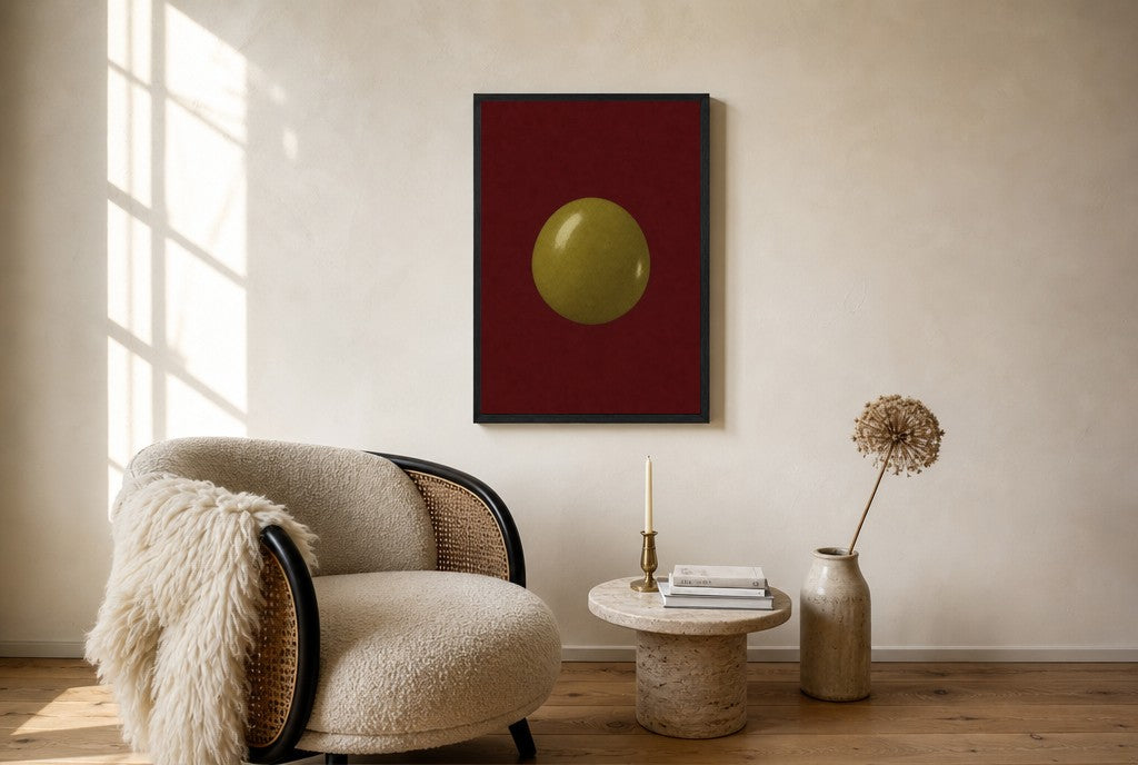 Oversized One Olive, Oxblood leaning at the baseboard of a sunlit living room.