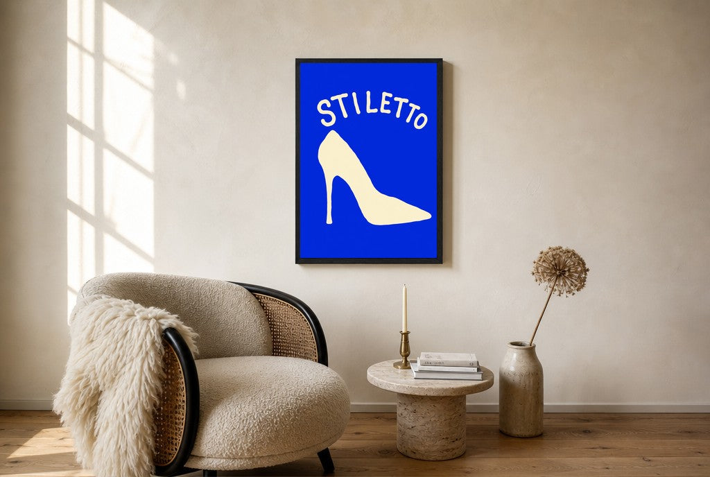 Oversized Stiletto leaning at the baseboard of a sunlit living room.