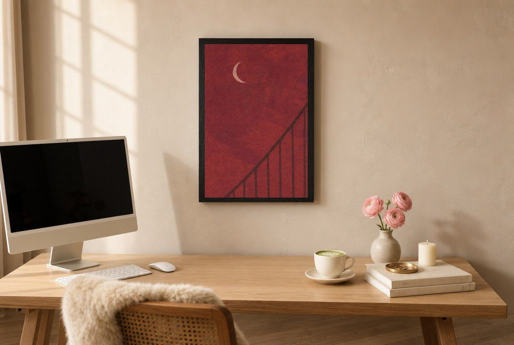 Framed Oxblood Sky, Crescent hung above a mid-century walnut console with ceramics.