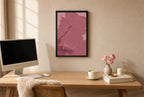 Framed Spilled Martini, Oxblood hung above a mid-century walnut console with ceramics.