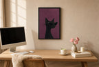 Framed Black Cat, Cat-Eye hung above a mid-century walnut console with ceramics.