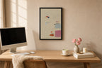 Framed Quiet Marks, Cream hung above a mid-century walnut console with ceramics.