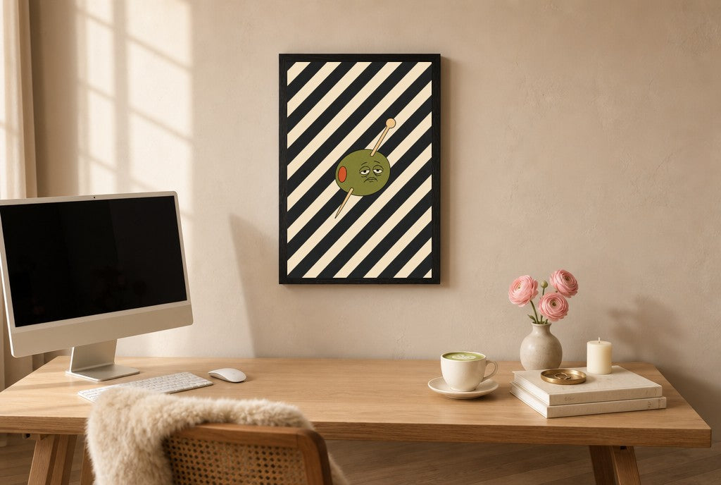 Framed Olive on Stripes hung above a mid-century walnut console with ceramics.