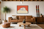 Framed Sleeping Bunny hung above a mid-century walnut console with ceramics.