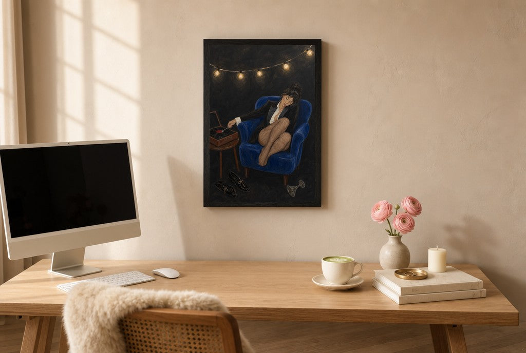 Framed Tux, Vinyl, Cobalt hung above a mid-century walnut console with ceramics.