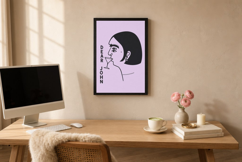 Framed Dear John hung above a mid-century walnut console with ceramics.