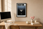 Framed Martini Recipe hung above a mid-century walnut console with ceramics.