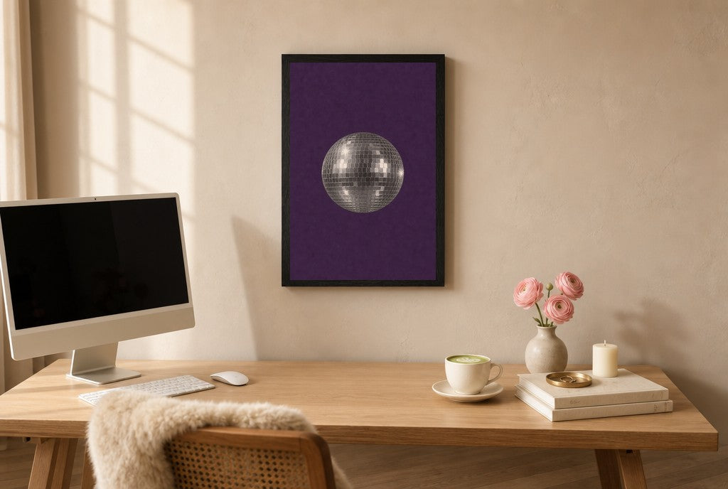 Framed Disco Ball, Purple hung above a mid-century walnut console with ceramics.