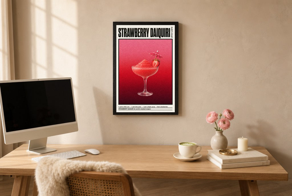 Framed Strawberry Daiquiri hung above a mid-century walnut console with ceramics.