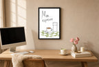 Framed Mm Espresso hung above a mid-century walnut console with ceramics.