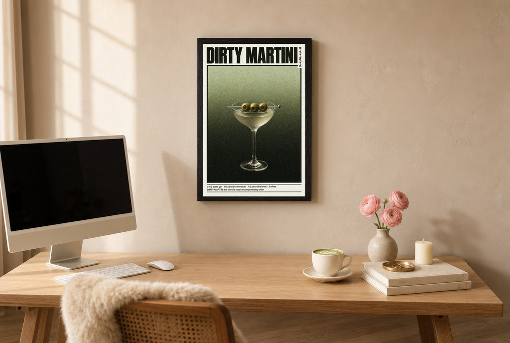 Framed Dirty Martini hung above a mid-century walnut console with ceramics.