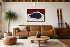 Framed Sleeping Greyhound hung above a mid-century walnut console with ceramics.