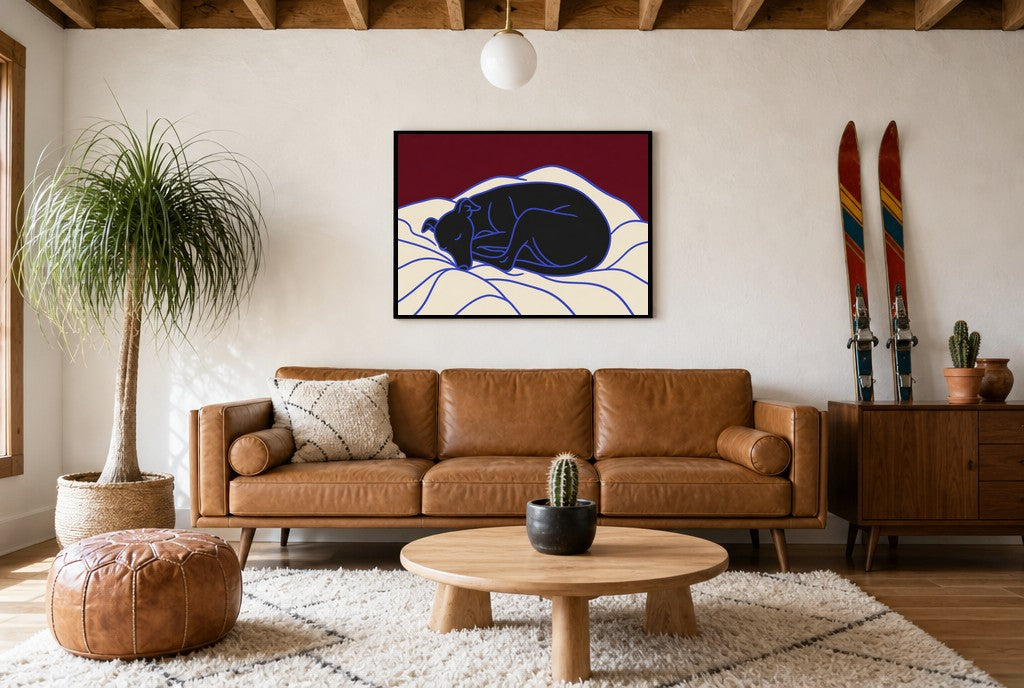 Framed Sleeping Greyhound hung above a mid-century walnut console with ceramics.