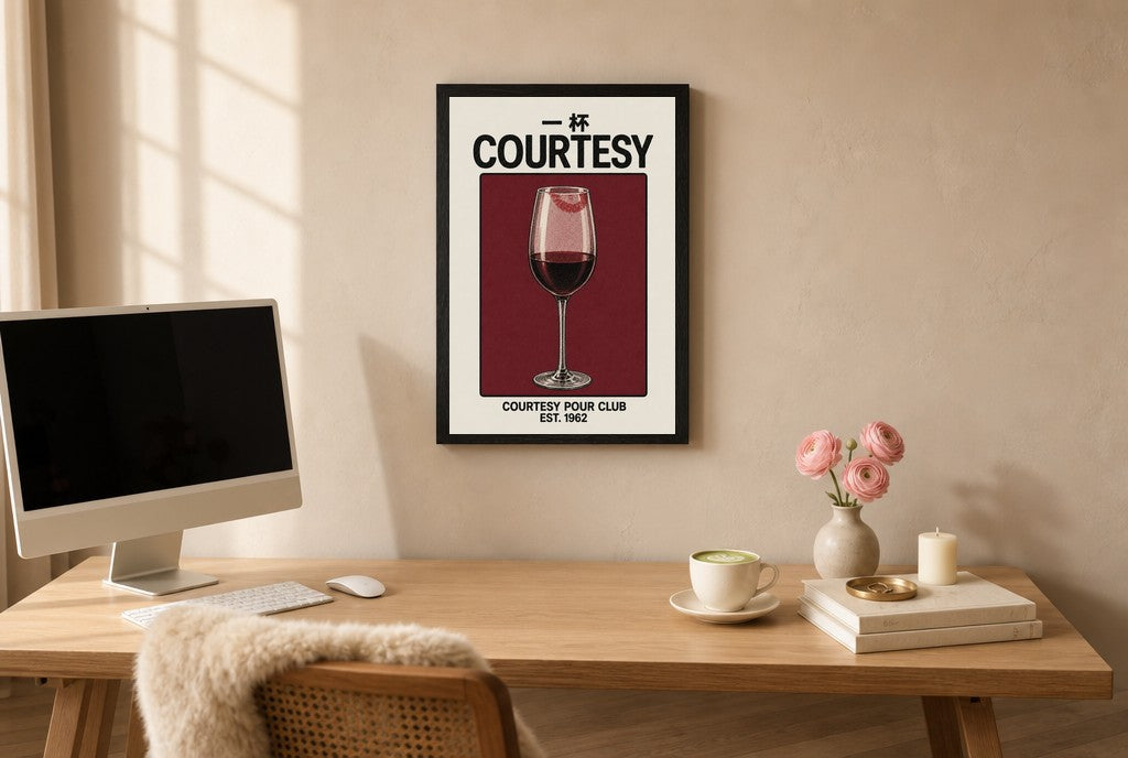 Framed Courtesy Pour, Wine hung above a mid-century walnut console with ceramics.