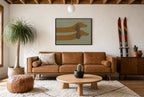 Framed Two Dachshunds, Sage hung above a mid-century walnut console with ceramics.