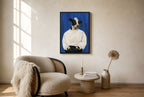 Oversized Calm in a White Sweater leaning at the baseboard of a sunlit living room.