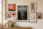 Smoked Old Fashioned mixed into a layered gallery wall of varied frame sizes.