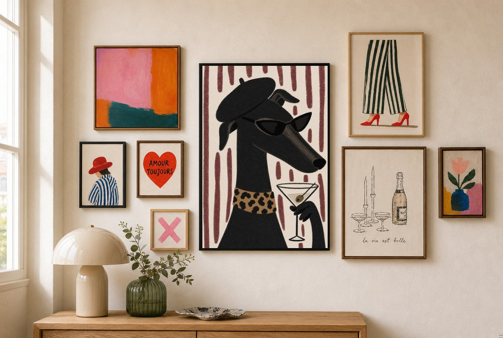 Greyhound, Beret, Martini mixed into a layered gallery wall of varied frame sizes.