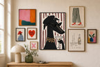 Greyhound, Beret, Martini mixed into a layered gallery wall of varied frame sizes.