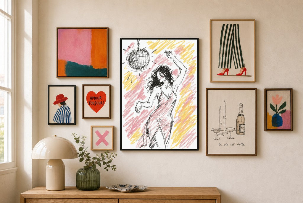 Disco Ball, Crayon mixed into a layered gallery wall of varied frame sizes.