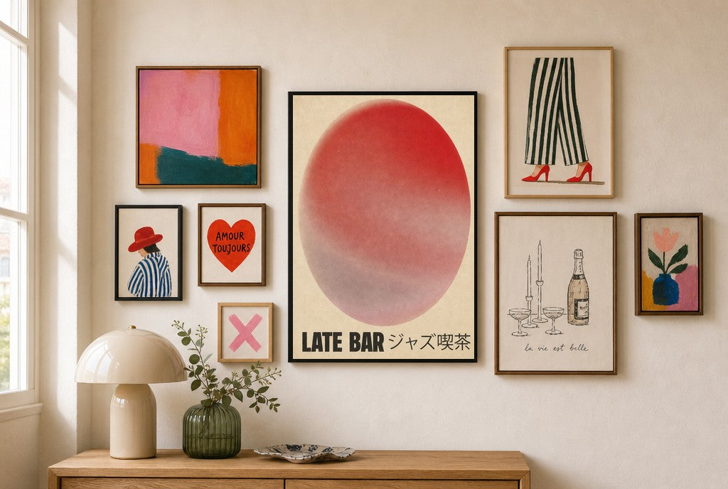 Late Bar mixed into a layered gallery wall of varied frame sizes.