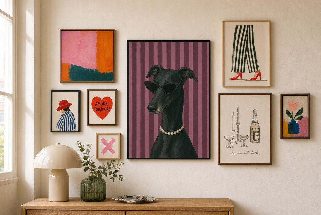 Greyhound, Pearls mixed into a layered gallery wall of varied frame sizes.