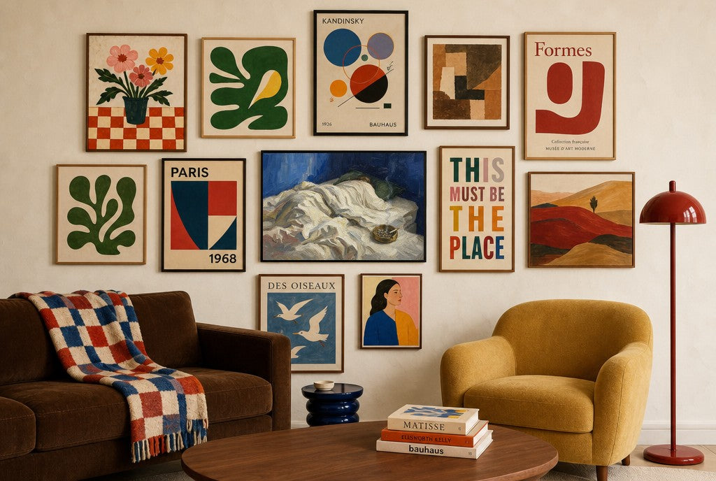 Sheets, Ashtray mixed into a layered gallery wall of varied frame sizes.