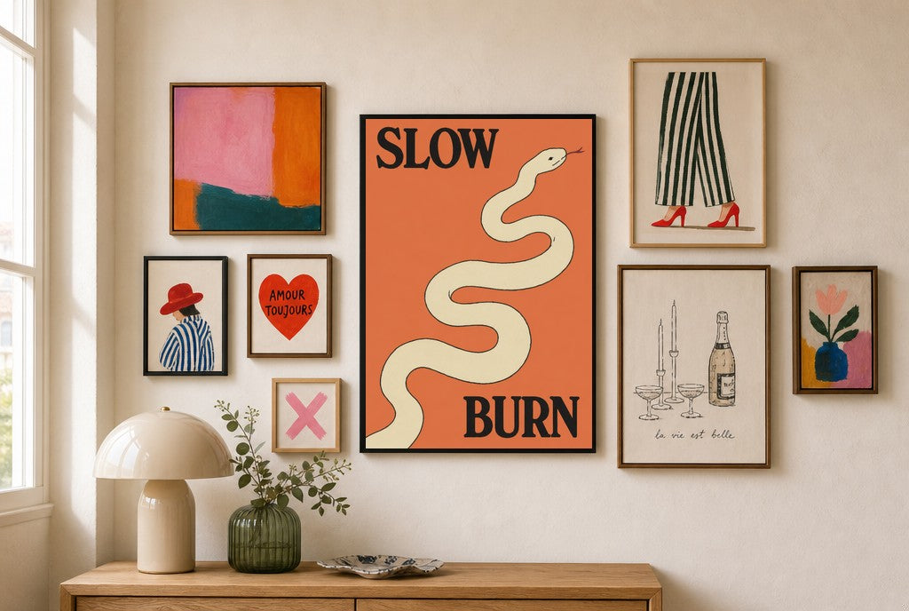 Slow Burn mixed into a layered gallery wall of varied frame sizes.