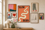 Slow Burn mixed into a layered gallery wall of varied frame sizes.
