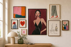Slip Dress, Oxblood mixed into a layered gallery wall of varied frame sizes.