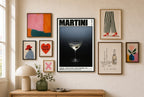 Martini Recipe mixed into a layered gallery wall of varied frame sizes.