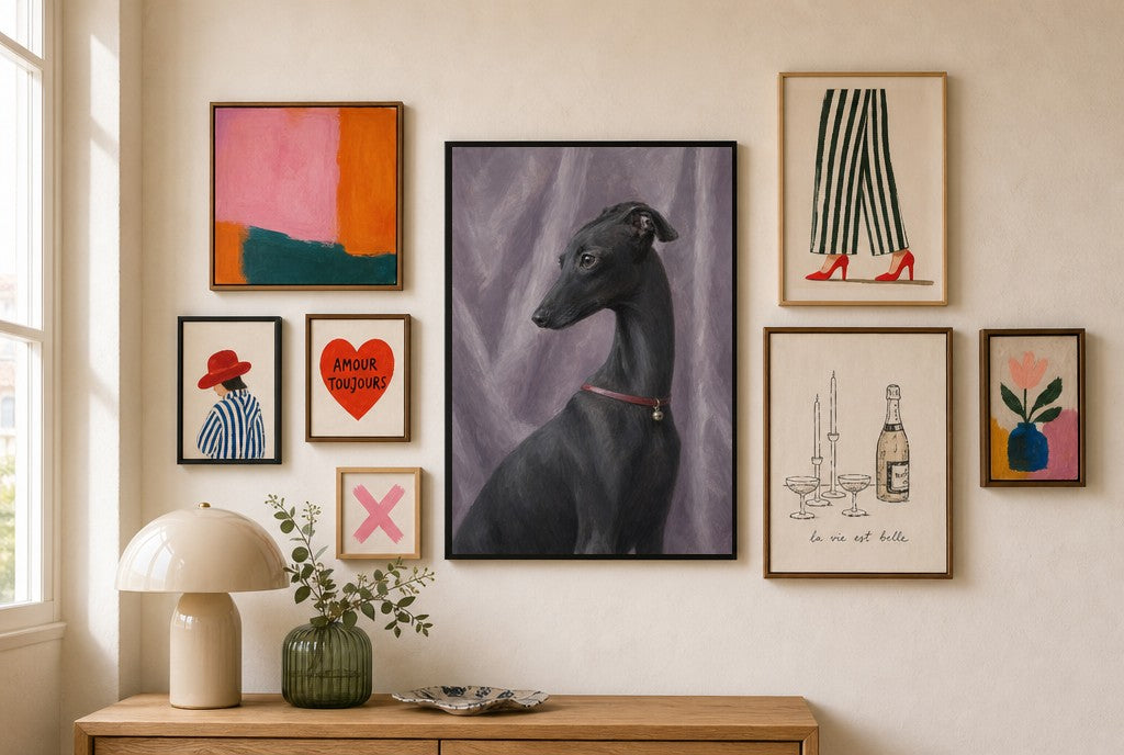 Black Greyhound, Red Collar mixed into a layered gallery wall of varied frame sizes.