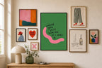 Would You Still Love Me mixed into a layered gallery wall of varied frame sizes.
