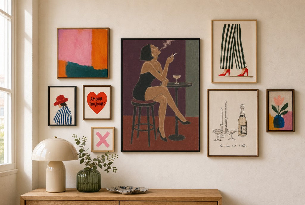 Bar Stool, Smoke mixed into a layered gallery wall of varied frame sizes.