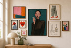 Fishnet Veil, Teal mixed into a layered gallery wall of varied frame sizes.