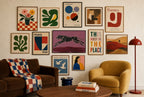 Black Panther, Plum mixed into a layered gallery wall of varied frame sizes.