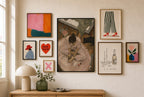 Painted Toenails, Black Cat mixed into a layered gallery wall of varied frame sizes.